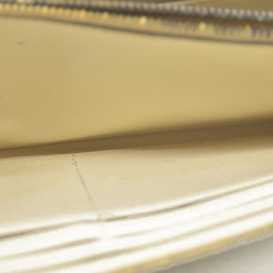 MIU MIU Logo Embossed Leather Zippy Long Wallet White