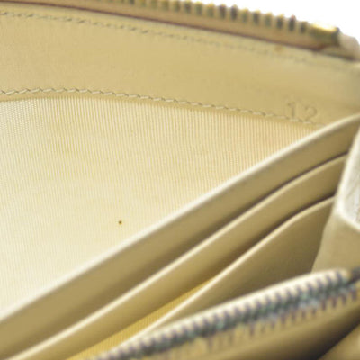 MIU MIU Logo Embossed Leather Zippy Long Wallet White