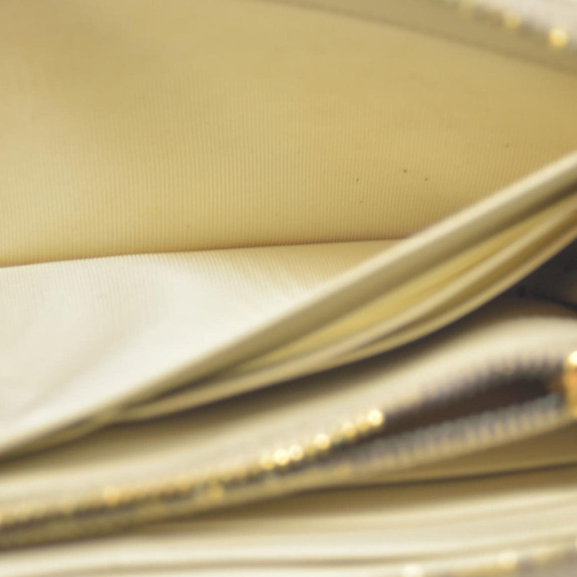 MIU MIU Logo Embossed Leather Zippy Long Wallet White