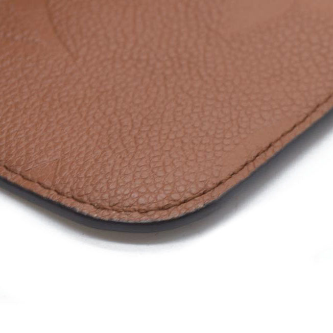 $2940 Louis Vuitton  Empreinte Monogram Giant Neverfull MM Pochette Cognac