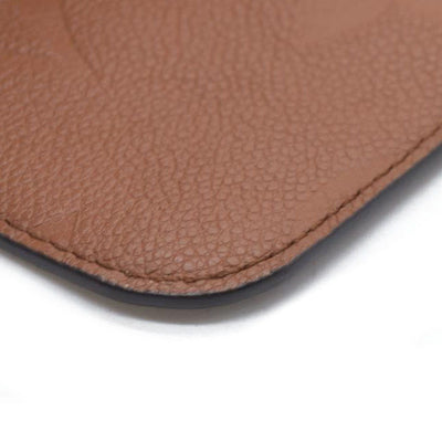 $2940 Louis Vuitton  Empreinte Monogram Giant Neverfull MM Pochette Cognac