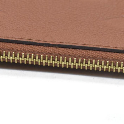 $2940 Louis Vuitton  Empreinte Monogram Giant Neverfull MM Pochette Cognac