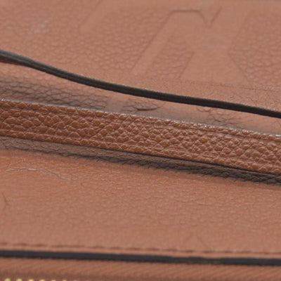 $2940 Louis Vuitton  Empreinte Monogram Giant Neverfull MM Pochette Cognac