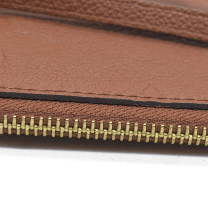 $2940 Louis Vuitton  Empreinte Monogram Giant Neverfull MM Pochette Cognac