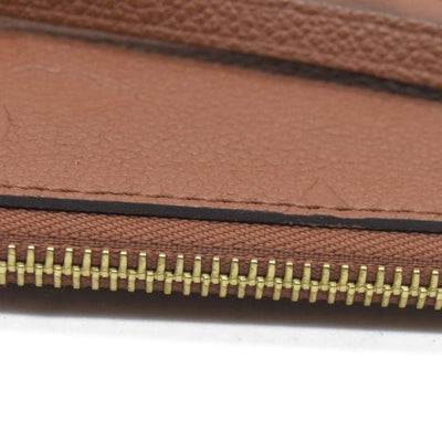 $2940 Louis Vuitton  Empreinte Monogram Giant Neverfull MM Pochette Cognac