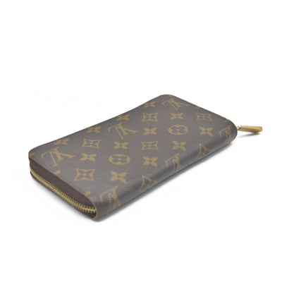 AUCTION $915 Louis Vuitton  Monogram Zippy Wallet CA5039