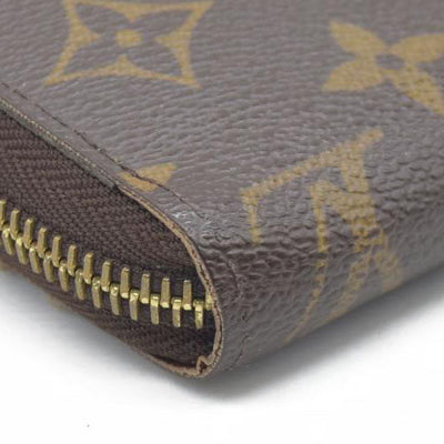 AUCTION $915 Louis Vuitton  Monogram Zippy Wallet CA5039