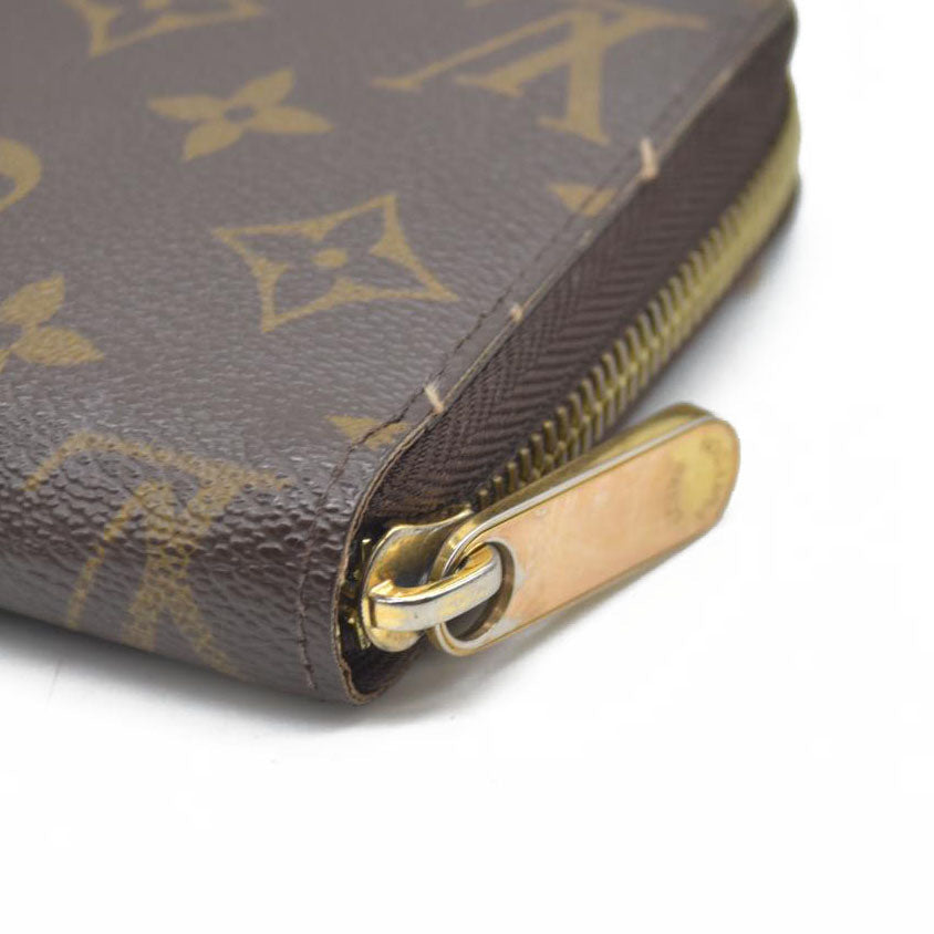 AUCTION $915 Louis Vuitton  Monogram Zippy Wallet CA5039