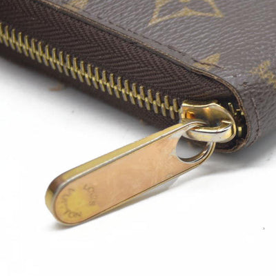 AUCTION $915 Louis Vuitton  Monogram Zippy Wallet CA5039