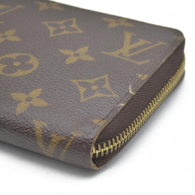 AUCTION $915 Louis Vuitton  Monogram Zippy Wallet CA5039