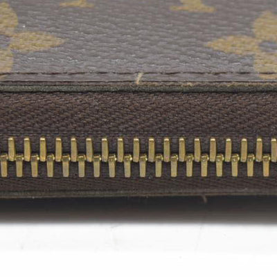 AUCTION $915 Louis Vuitton  Monogram Zippy Wallet CA5039