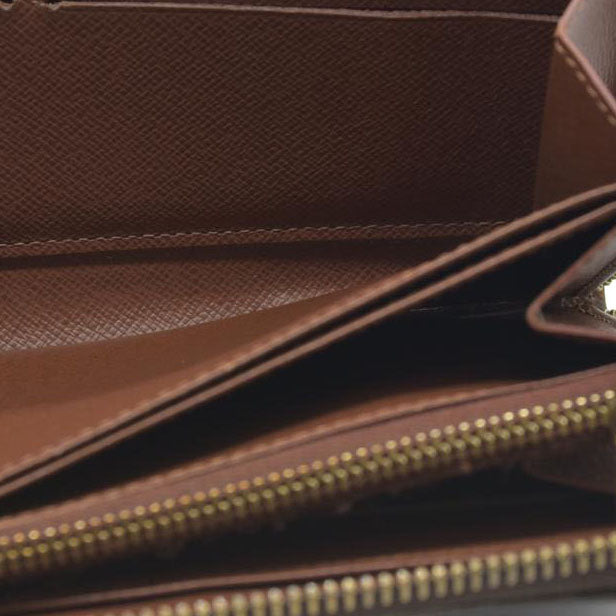 AUCTION $915 Louis Vuitton  Monogram Zippy Wallet CA5039