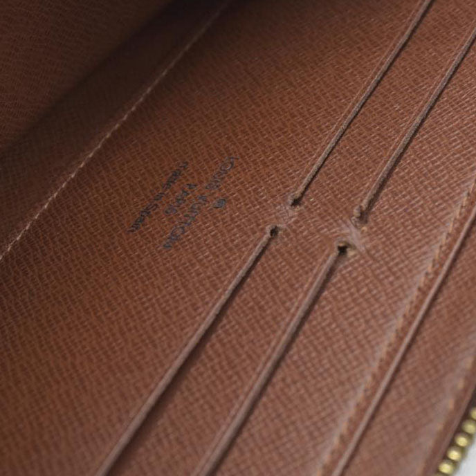 AUCTION $915 Louis Vuitton  Monogram Zippy Wallet CA5039