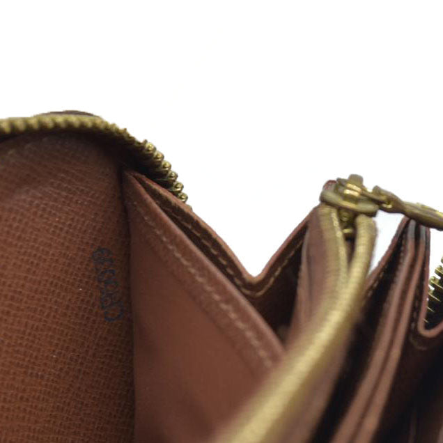 AUCTION $915 Louis Vuitton  Monogram Zippy Wallet CA5039
