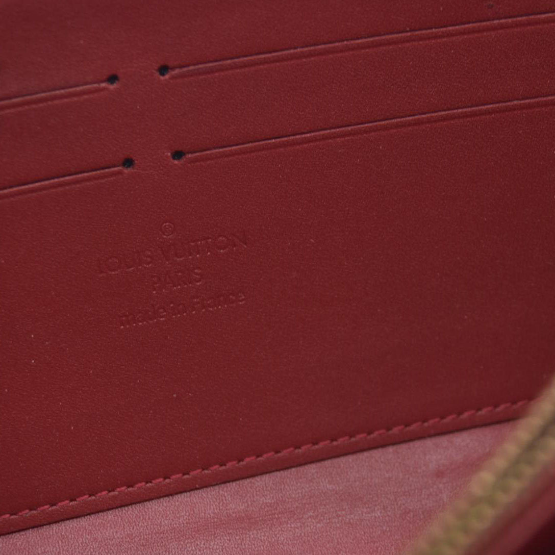 $970 Louis Vuitton Pomme d'Amour Monogram Vernis Zippy Wallet CONSIGNMENT