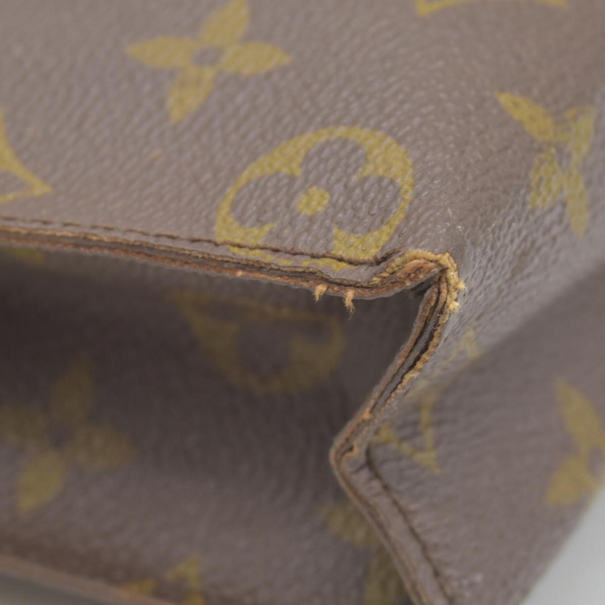 $1120 LOUIS VUITTON Monogram Toiletry 26