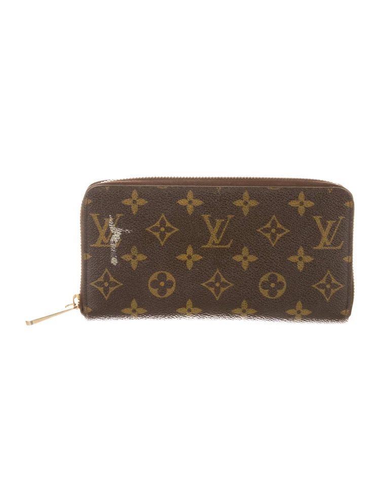 $915 Louis Vuitton  2014 LV Monogram Zippy Wallet
