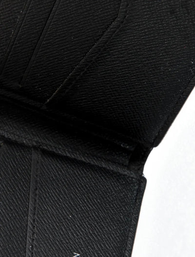 $545 Louis Vuitton  Monogram Eclipse Coated Canvas Slender NM