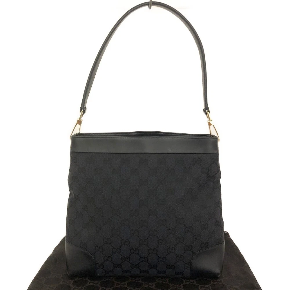 $1200 GUCCI Canvas Vintage GG Shoulder Bag