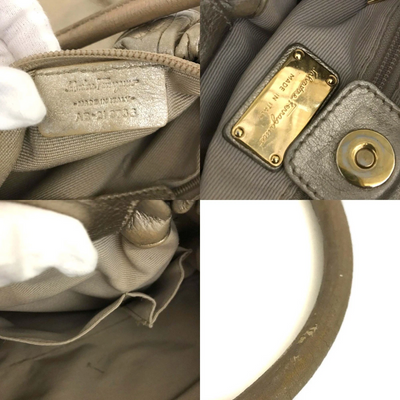 $950 Salvatore Ferragamo Vara Leather Hand Bag Gold