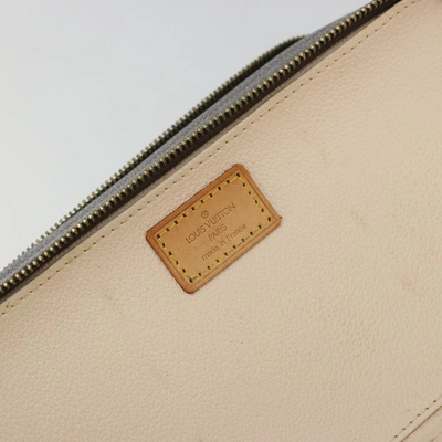 $750 LOUIS VUITTON Monogram Trousse Blush PM VI0052