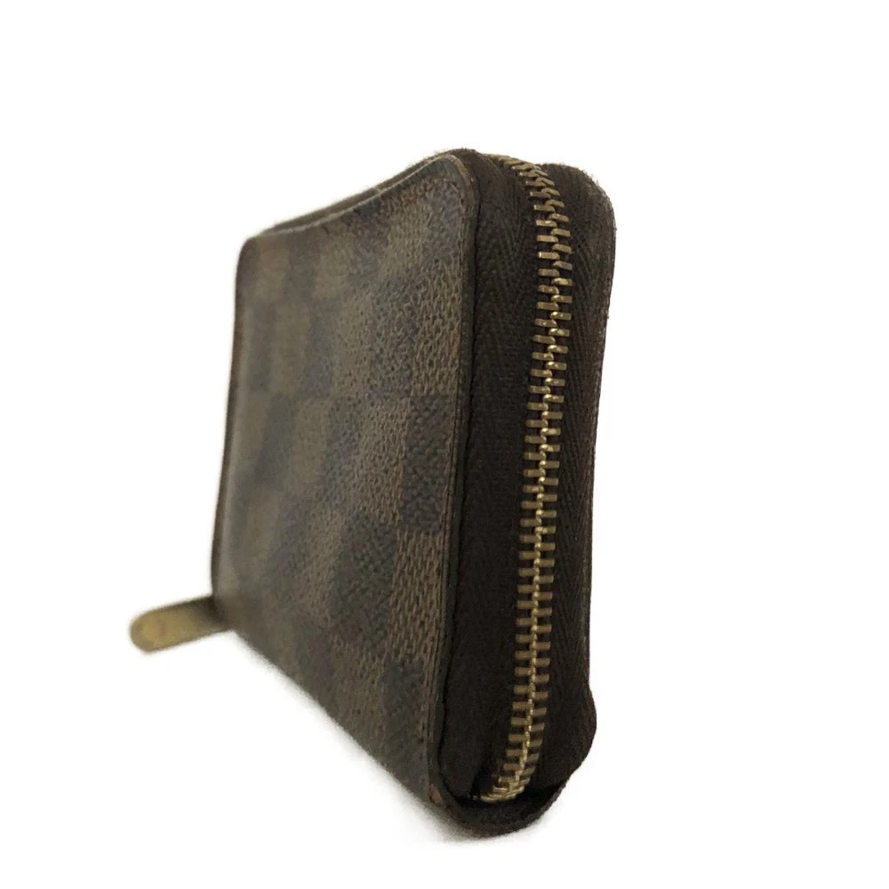 $560 2009 Louis Vuitton Damier Ebene Zippy Coin Wallet  SN0089
