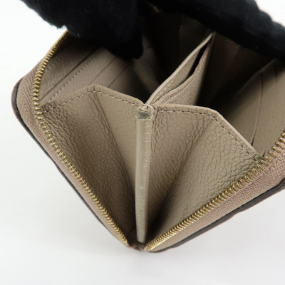$760 Louis Vuitton Monogram Empreinte Round Zippy Coin Case Beige RFID