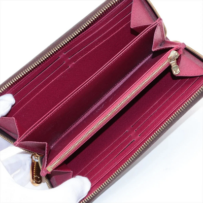 $915 LM0280 2020 Louis Vuitton Monogram Zippy Wallet Fuchsia
