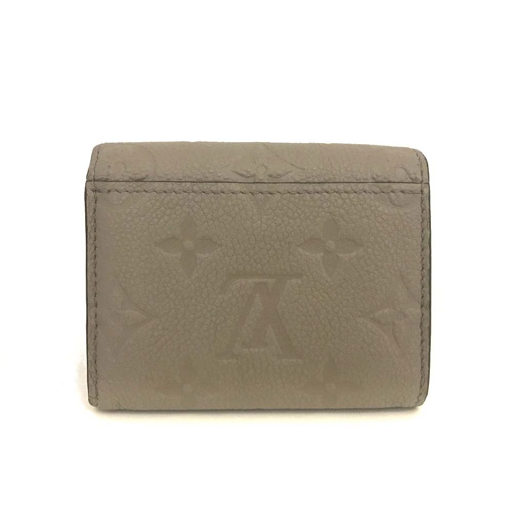 $795 Louis Vuitton Monogram Empreinte Portefeuille Zoe Mini Wallet