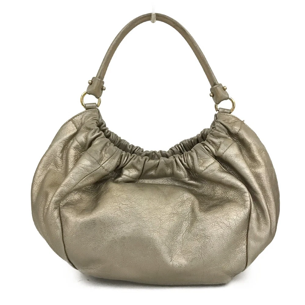 $950 Salvatore Ferragamo Vara Leather Hand Bag Gold