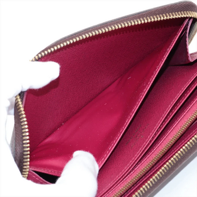 $915 LM0280 2020 Louis Vuitton Monogram Zippy Wallet Fuchsia