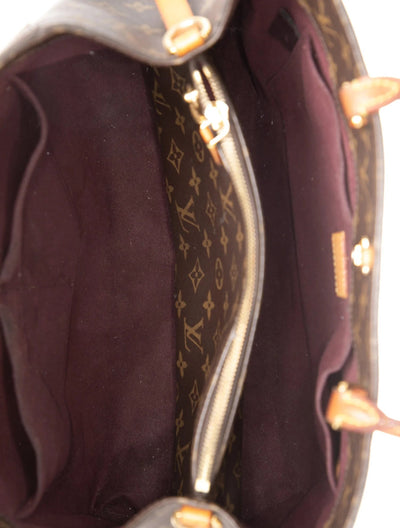 $2690 Louis Vuitton Monogram Montaigne GM
