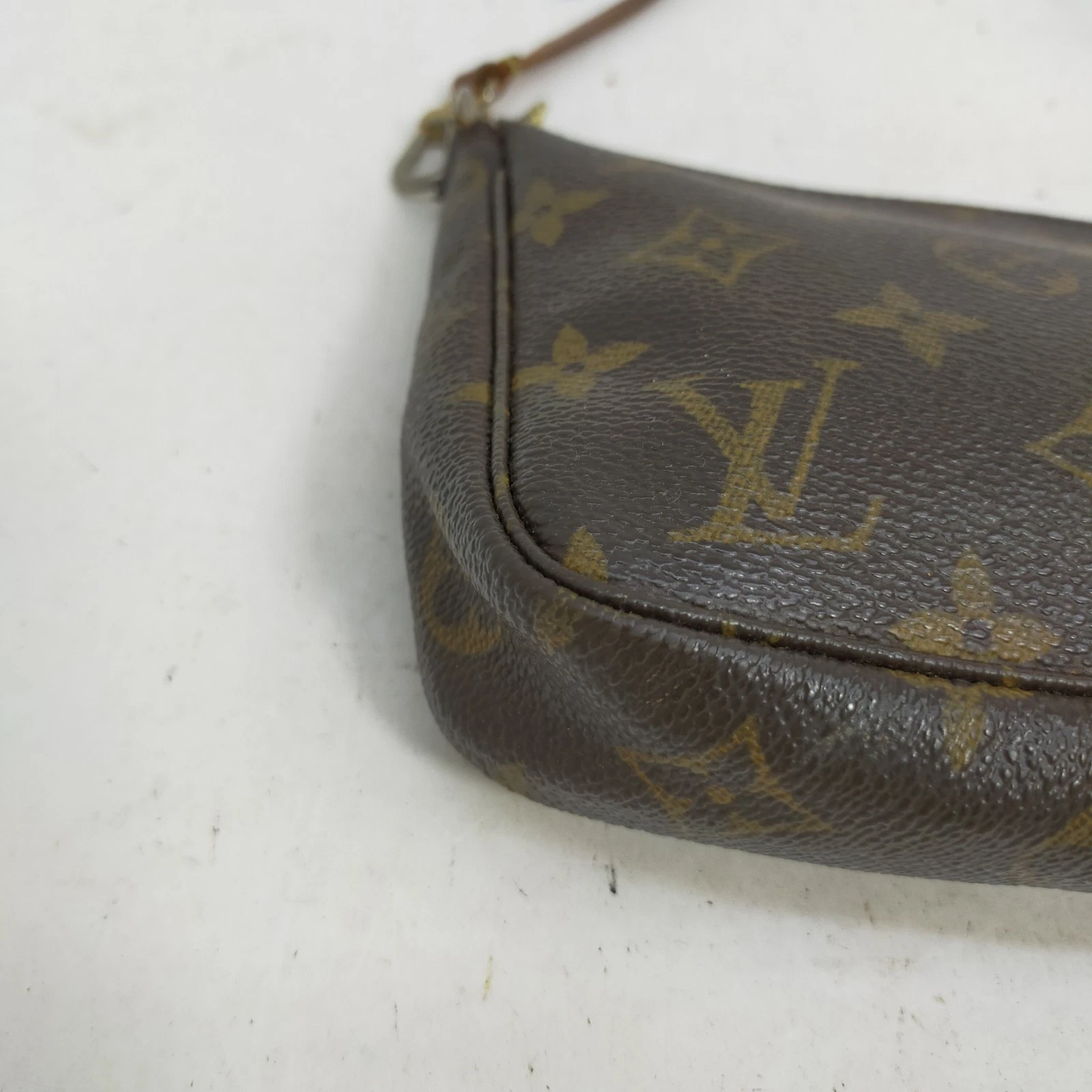 Louis Vuitton Pochette Accessoires Brown Monogram VI0031