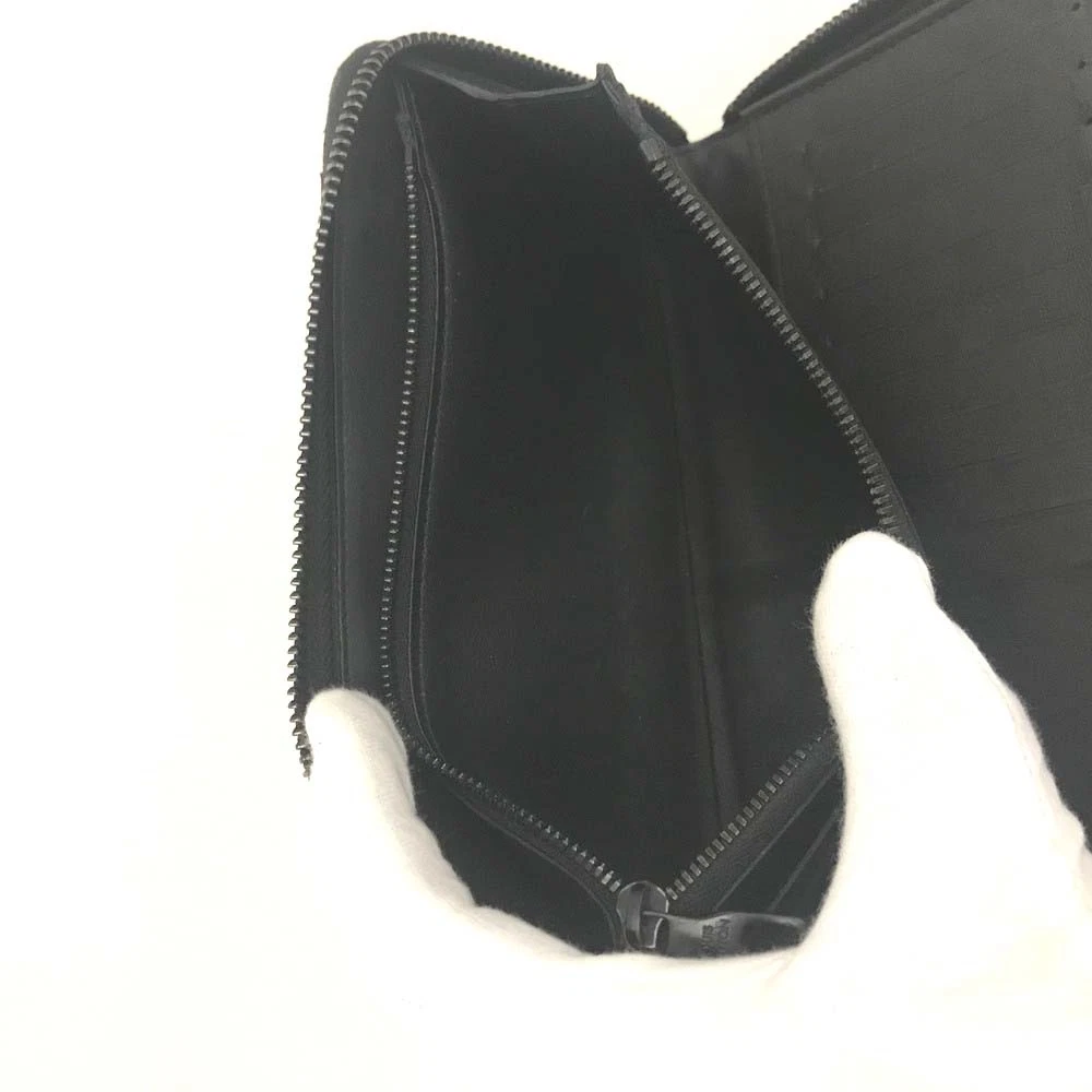 $1210 Louis Vuitton Monogram Empreinte Vertical Zippy Round Long Wallet