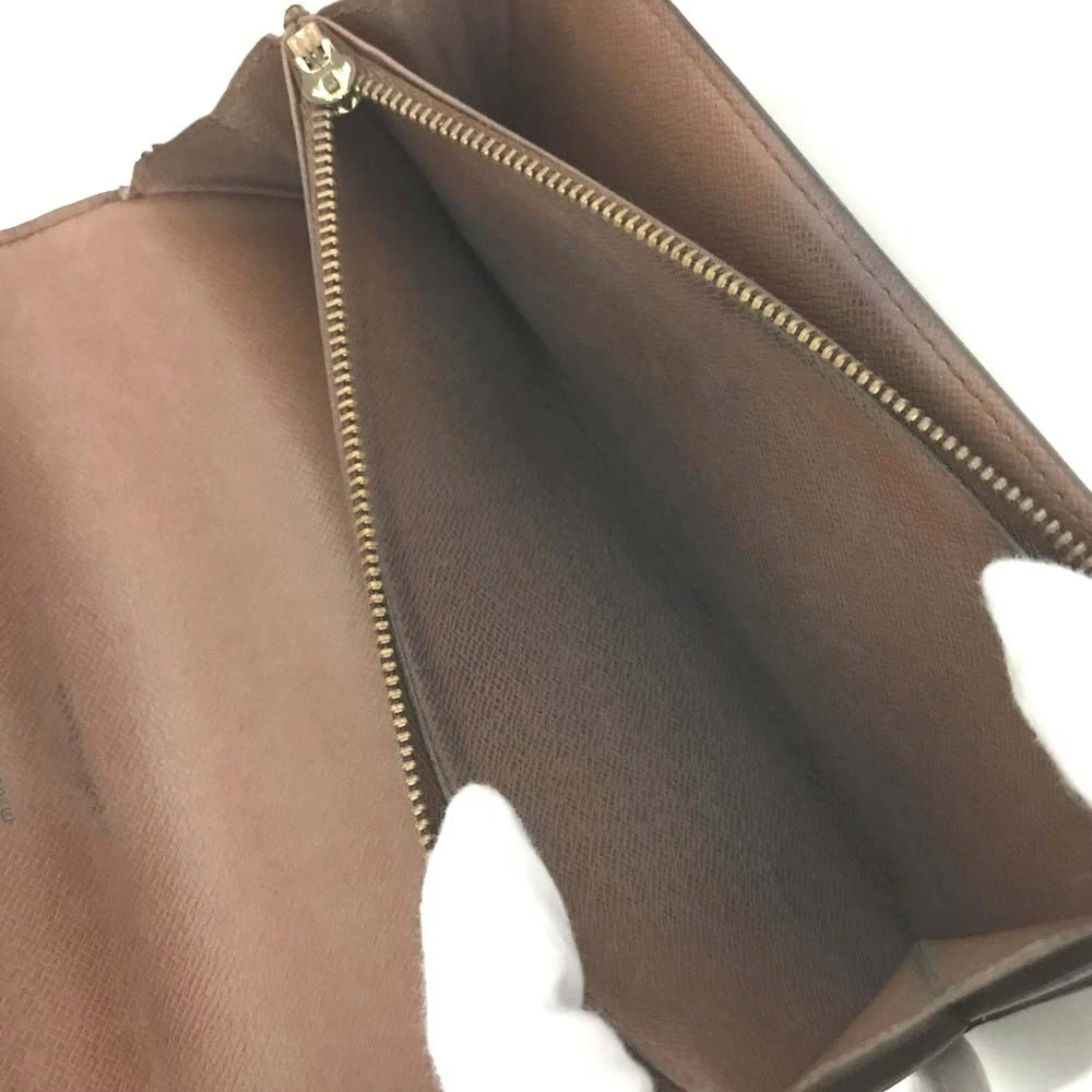 $720 1995 Louis Vuitton Monogram Sarah Wallet CA0975