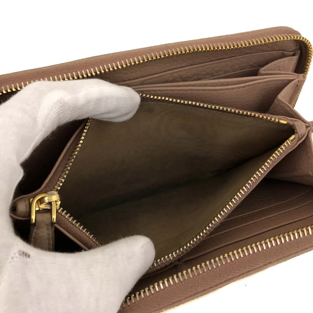 $1070  PRADA Saffiano Metal Logo Zip Around Long Wallet Pink