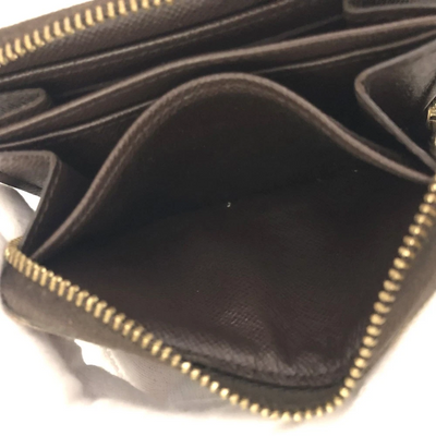 $560 2009 Louis Vuitton Damier Ebene Zippy Coin Wallet  SN0089