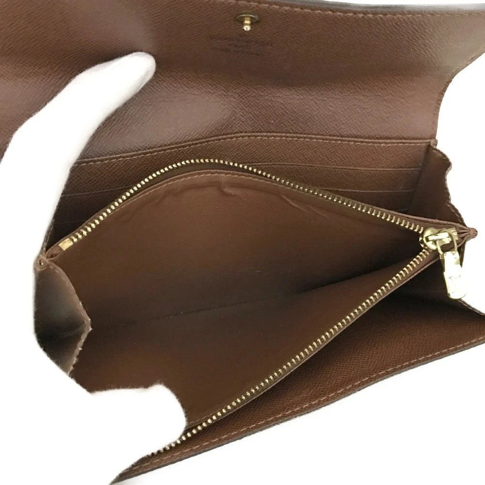 $775 2006 Louis Vuitton Monogram Sarah Wallet MI1026