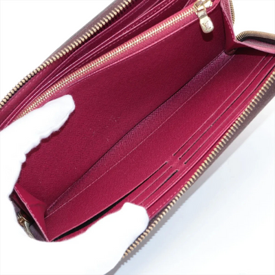 $915 LM0280 2020 Louis Vuitton Monogram Zippy Wallet Fuchsia