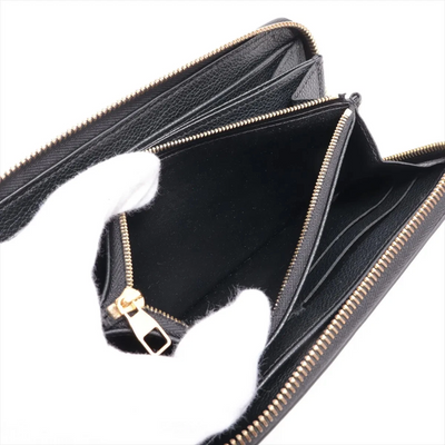 $1170 Louis Vuitton Empreinte Zippy Wallet Black
