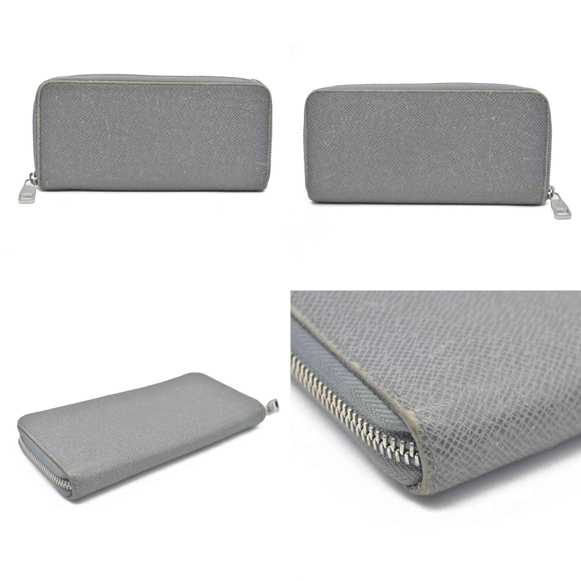 AUCTION $985 Louis Vuitton  Taiga Zippy Organizer Wallet Glacier