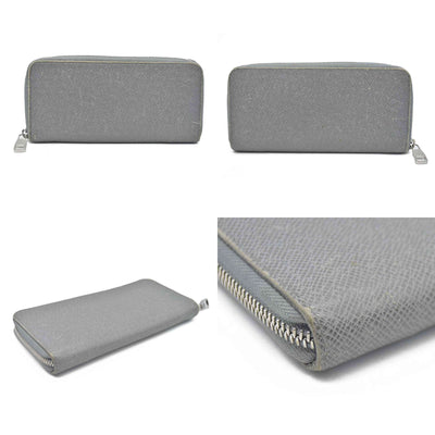 AUCTION $985 Louis Vuitton  Taiga Zippy Organizer Wallet Glacier