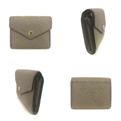 $795 Louis Vuitton Monogram Empreinte Portefeuille Zoe Mini Wallet