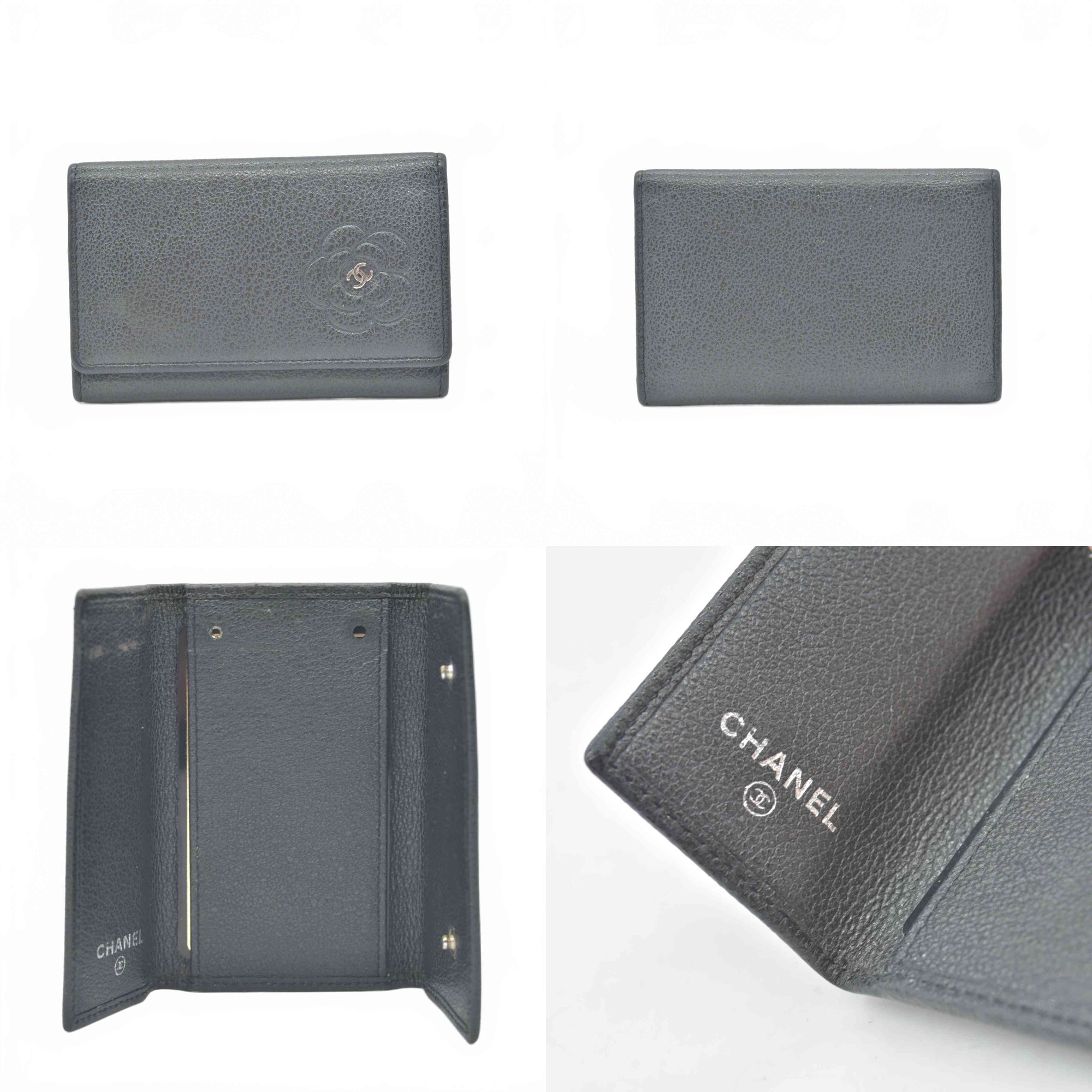 $750 2010 Chanel Embossed Camellia Card Holder Black