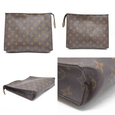 $1070 Louis Vuitton Monogram Toiletry 26