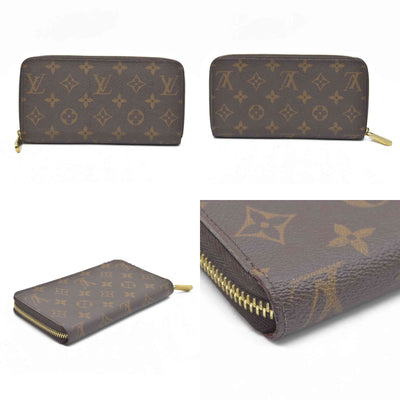$915 Louis Vuitton  Monogram Zippy Wallet