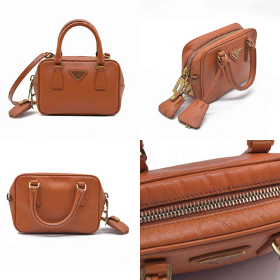 $750 Prada Saffiano Lux Mini Crossbody Bag