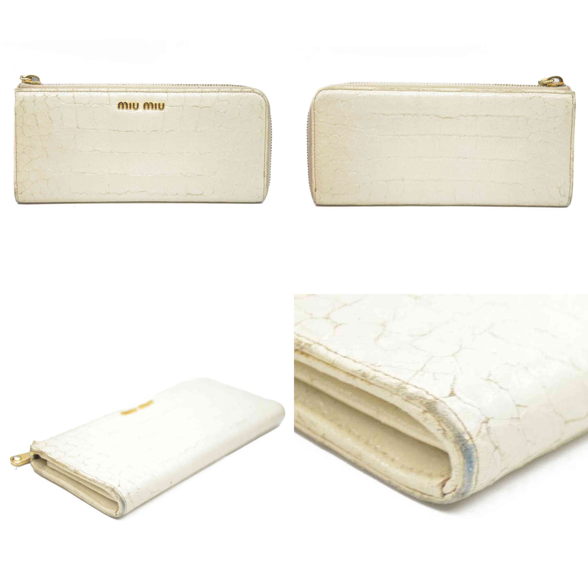 MIU MIU Logo Embossed Leather Zippy Long Wallet White