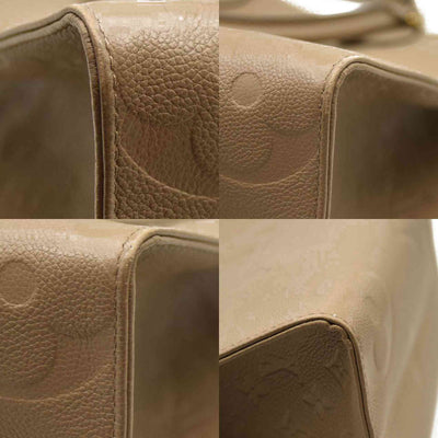 Louis Vuitton  Empreinte Monogram Giant Onthego MM Tourterelle