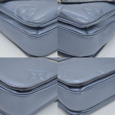 $3100 Louis Vuitton Metallic Empreinte Monogram Giant Pochette Metis Navy Nacre